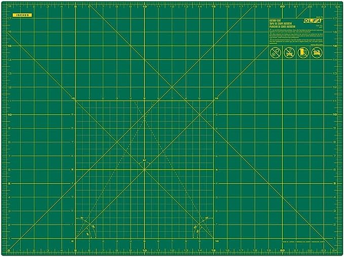 A green self healing cutting mat to cut things on.